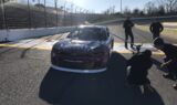 Byron displays 2018 Liberty University firesuit and Chevy
