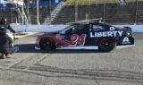 Byron displays 2018 Liberty University firesuit and Chevy