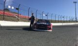 Byron displays 2018 Liberty University firesuit and Chevy