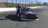 Byron displays 2018 Liberty University firesuit and Chevy
