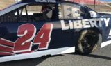 Byron displays 2018 Liberty University firesuit and Chevy