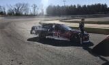 Byron displays 2018 Liberty University firesuit and Chevy
