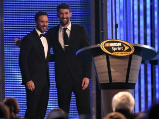 Michael Phelps surprises Jimmie Johnson with banquet introduction