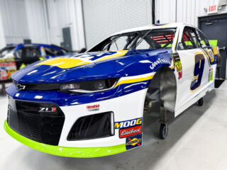 Artifact of the Week: The Chase Elliott Chevy that rallied at the Charlotte ROVAL, plus a hat, a sticker AND a diecast!